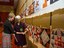 Members of Oklahoma Home and Community Education take time during their state meeting in July to view quilt block challenge entries. - 